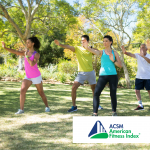 group of people doing tai chi in the park